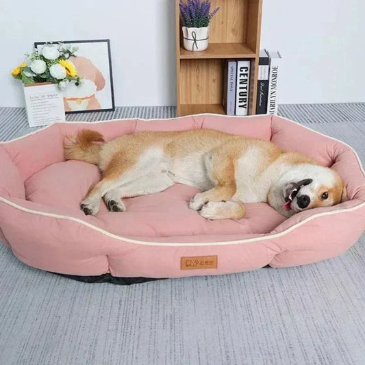 How to Choose The Best Pet Bed for Your Dog or Cat - Dog lounging in a pink pet bed.