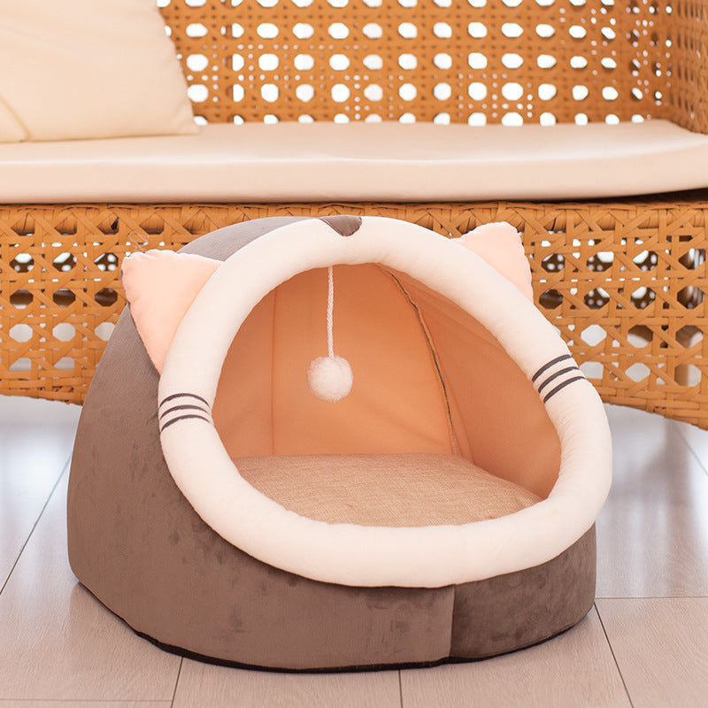 Foldable cat bed cave in soft PP cotton with a tabby kitten sleeping inside