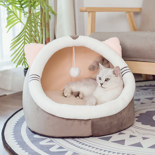 Foldable cat bed cave in soft PP cotton with a tabby kitten sleeping inside