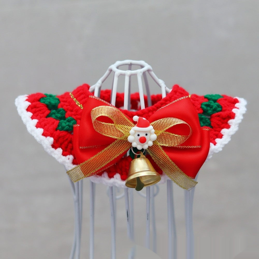 Christmas pet collar with green lace and red tulip pattern worn by a fluffy cat