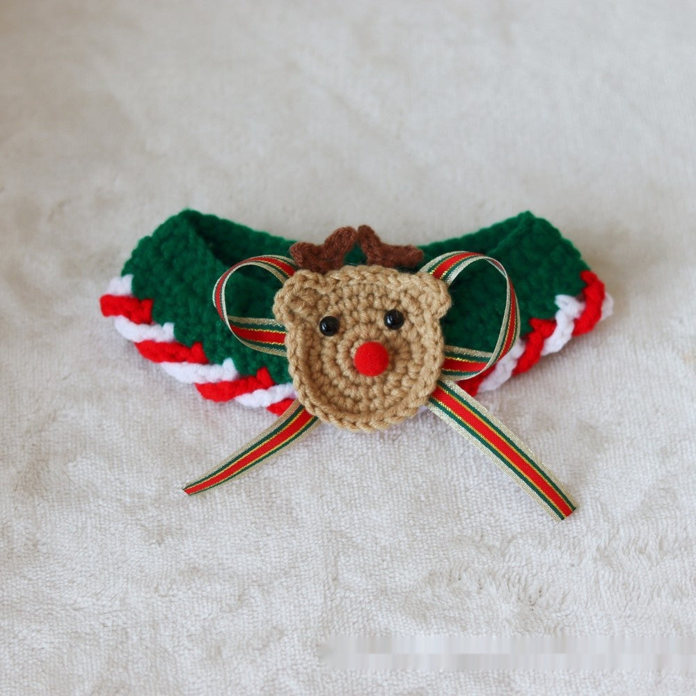 Christmas pet collar with green lace and red tulip pattern worn by a fluffy cat