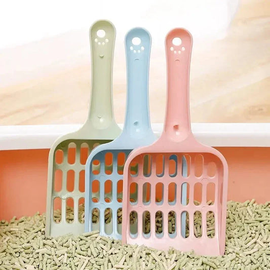 Cat Litter Shovel scooping waste from a litter box