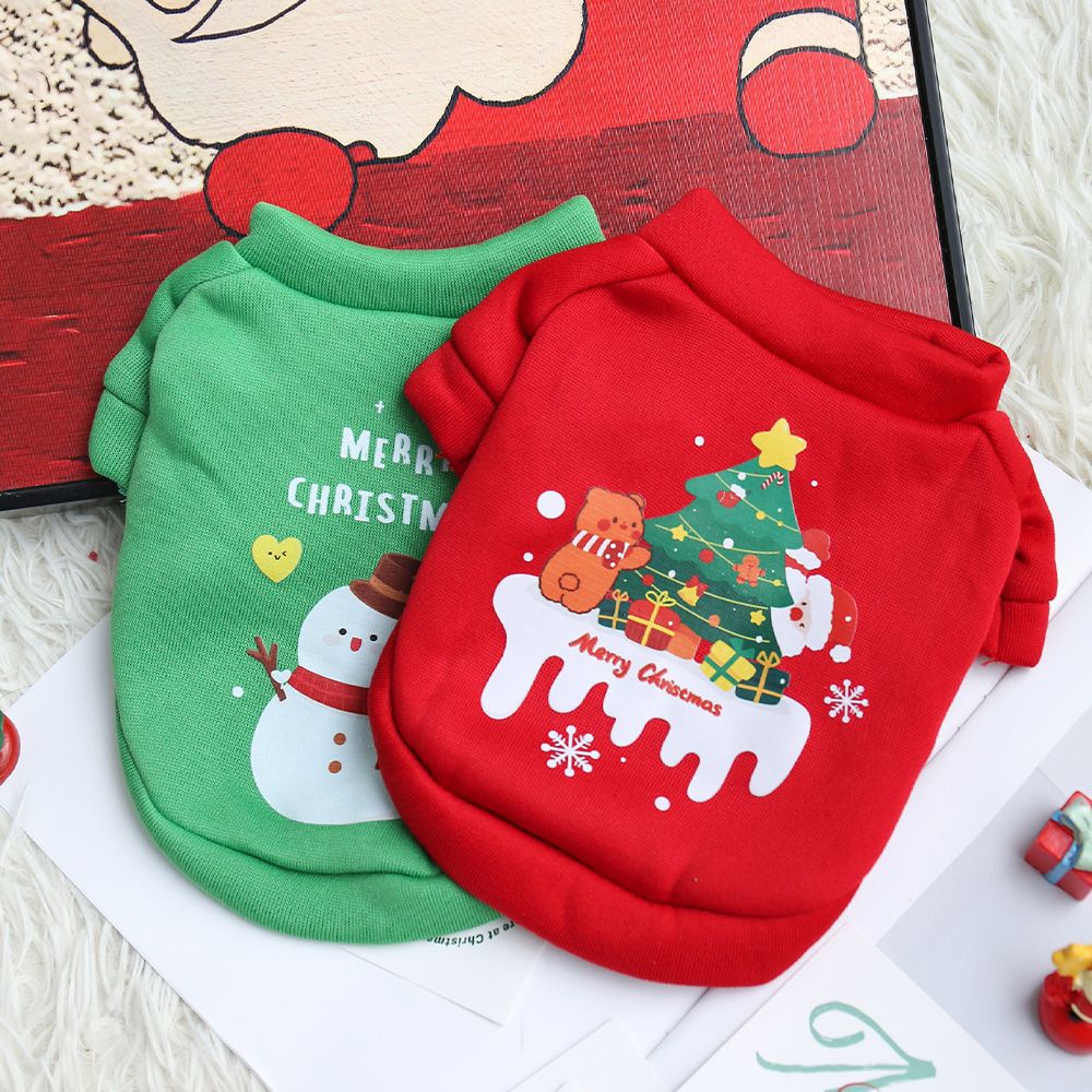 Dog Christmas crew neck sweater in red with Christmas tree design worn by a small dog