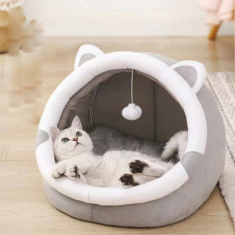 Foldable cat bed cave in soft PP cotton with a tabby kitten sleeping inside