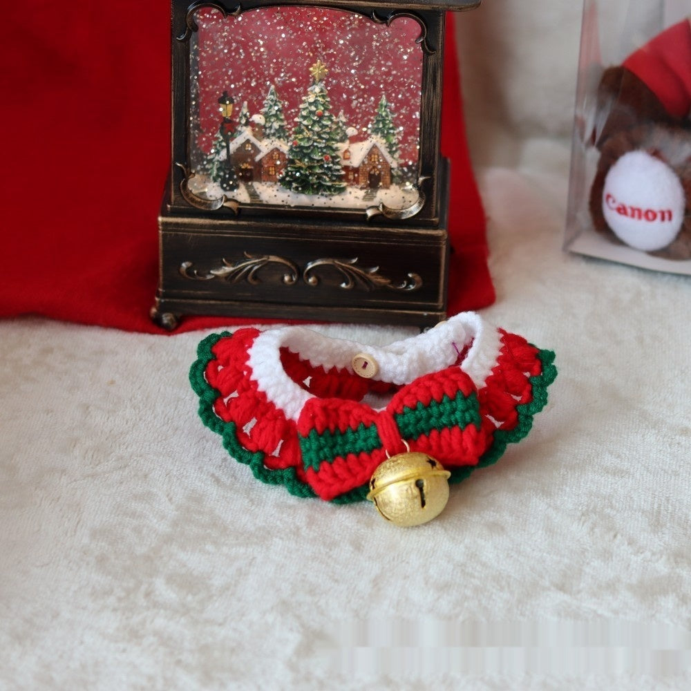 Christmas pet collar with green lace and red tulip pattern worn by a fluffy cat